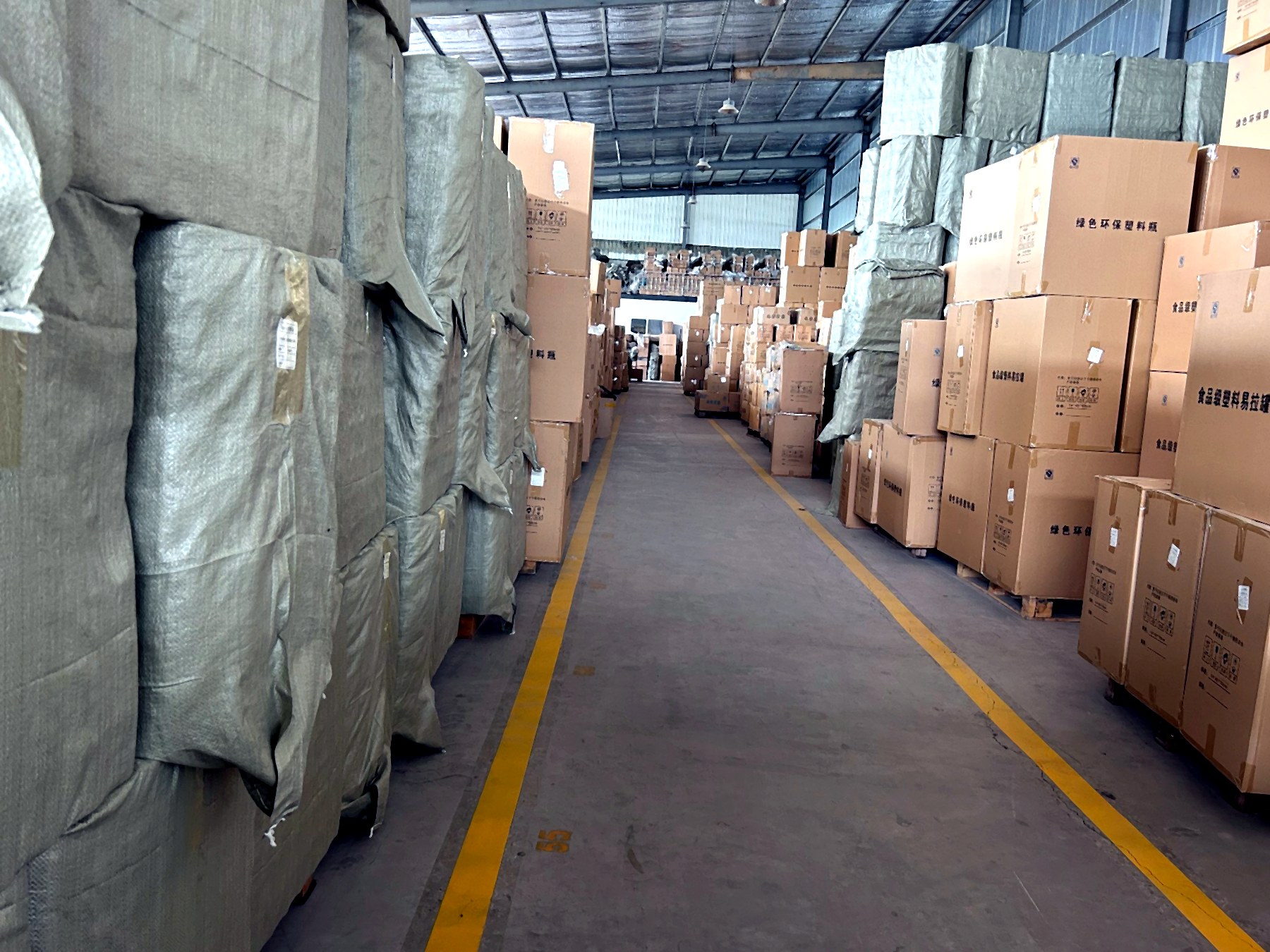 Warehouse aisle with packed goods